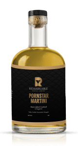 A Pornstar Martini cocktail bottle with a black label.