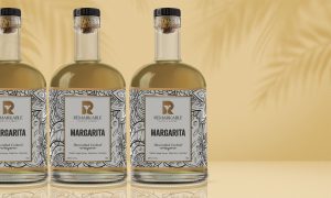 A 3 bottles of Margarita with a white label