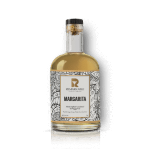 A bottle of Margarita with a white label. Handcrafted Cocktails made with passion and expertise.